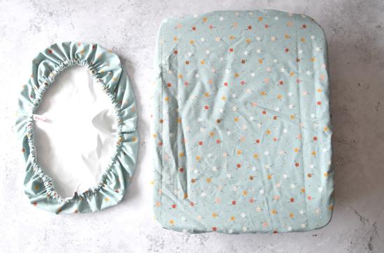 Preview: Rechteckige Abdeckhaube "Kleine Blumen auf hellblau"